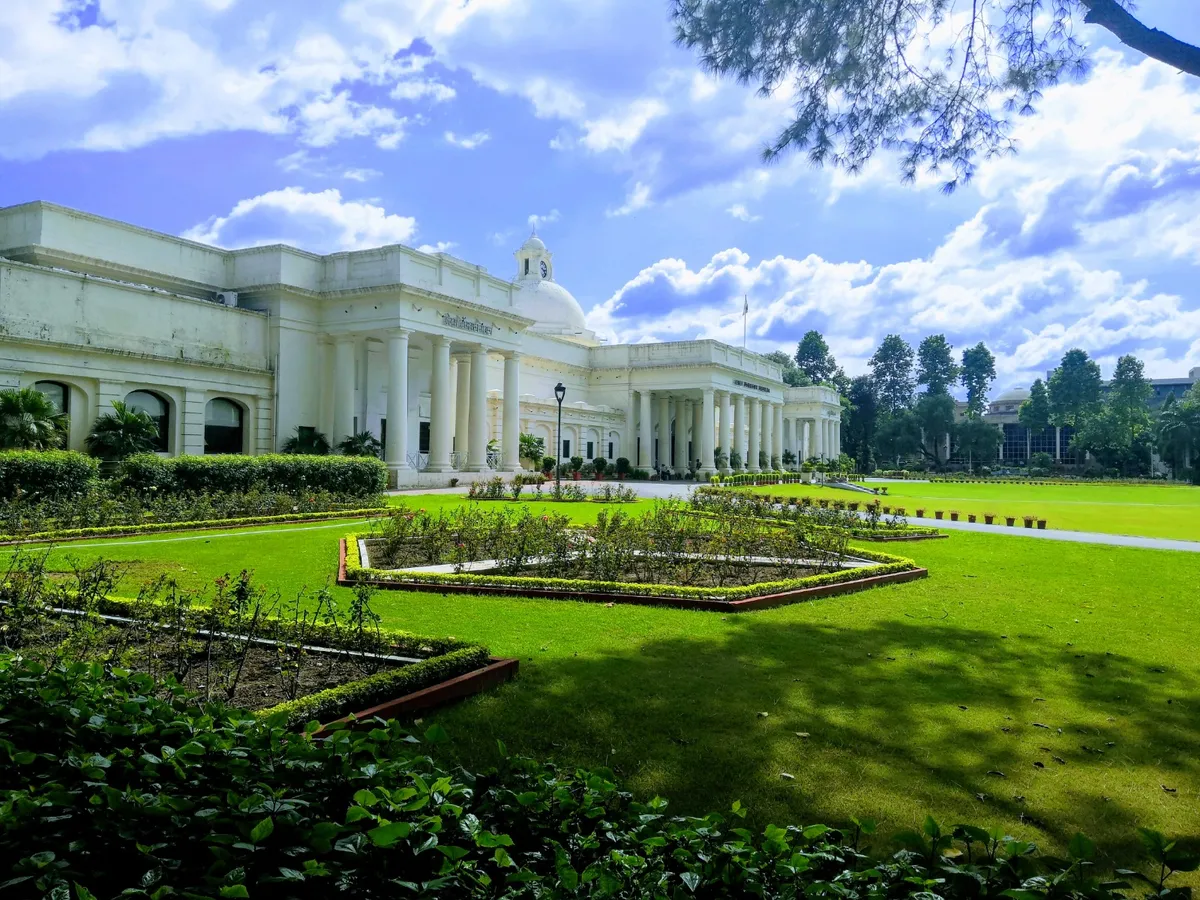 The main building of IIT Roorkee, behind its lawns and gardens