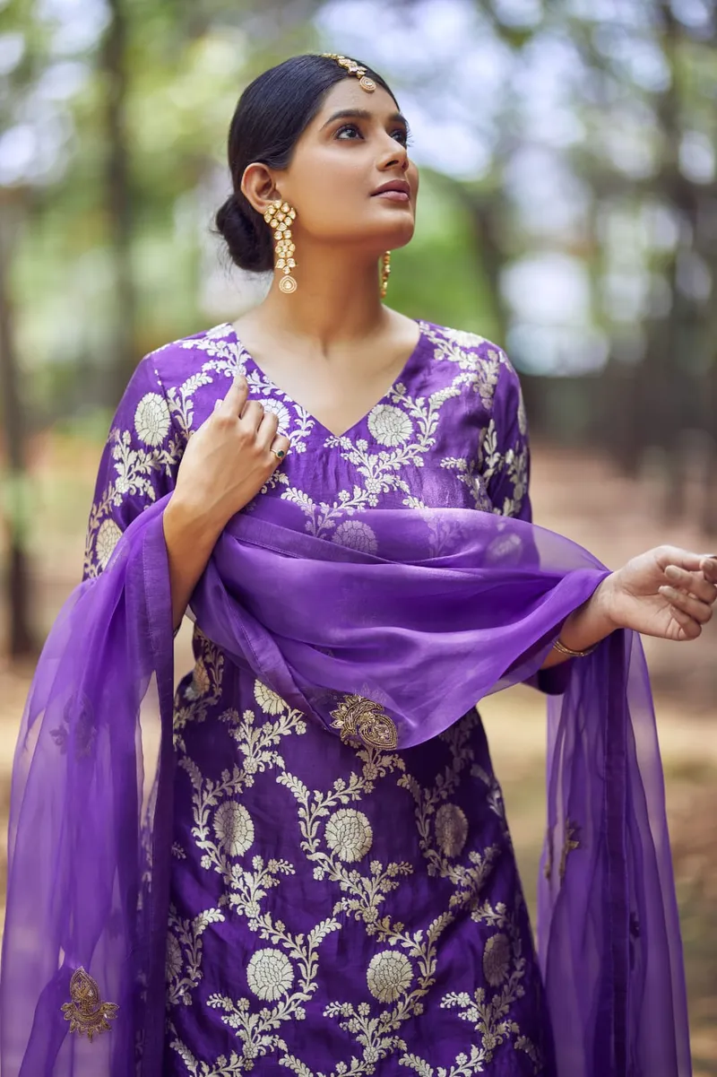 Snehal Patil in a purple embroidered outfit outdoors